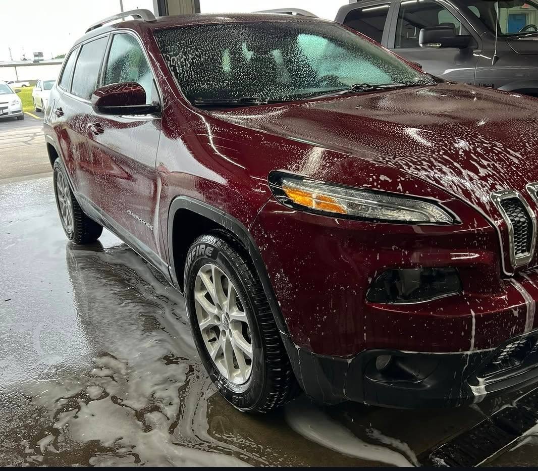 Vehicle receiving a foam wash from Thomas’s Mobile Detailing
